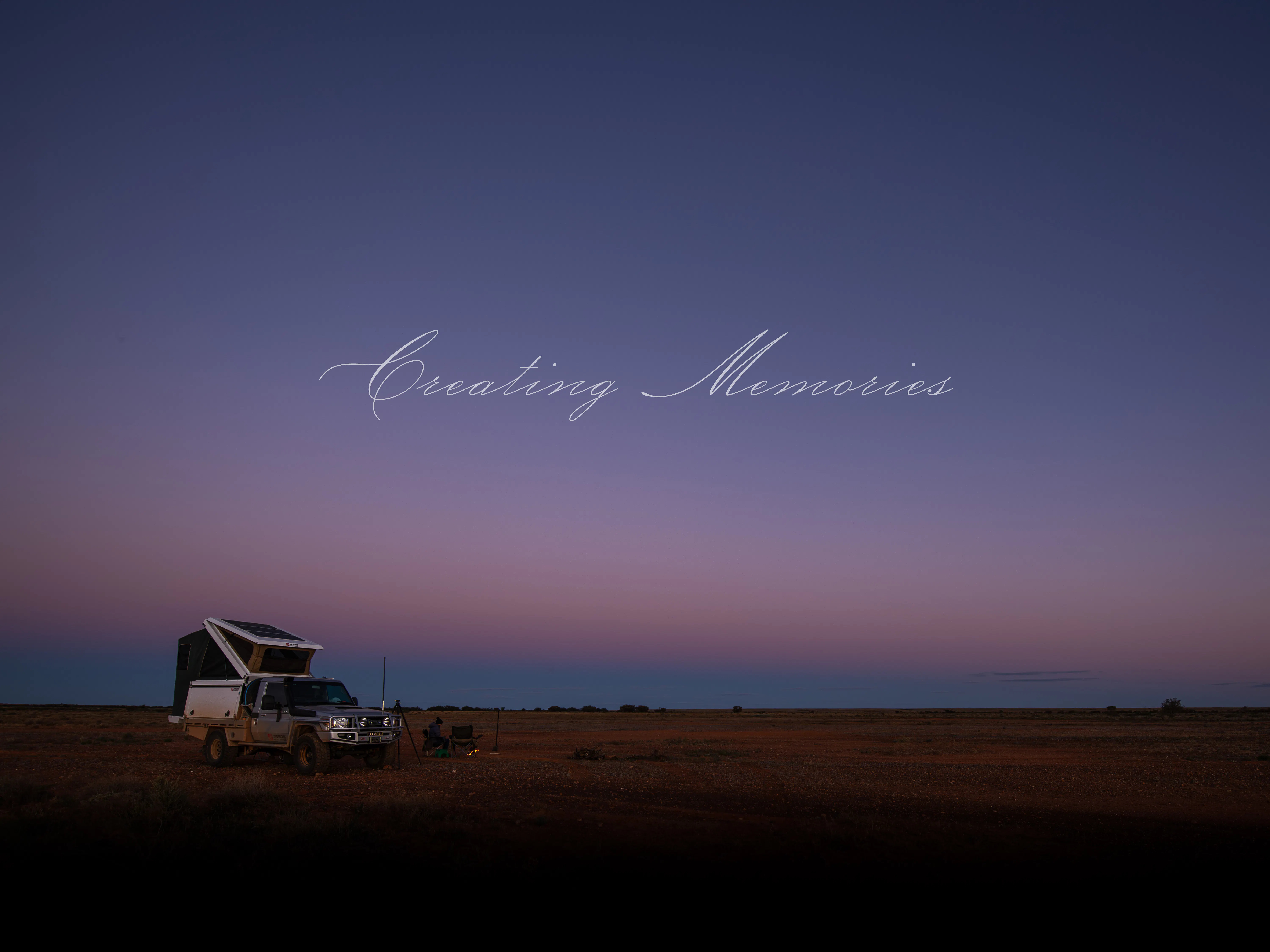Camper in the bush with creating memories text